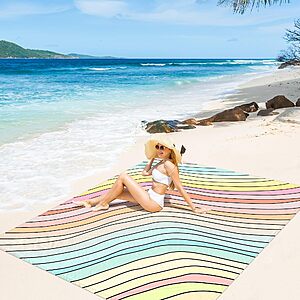 SkyNature Beach Blanket Sandproof Waterproof, Large Beach Mat for 2-4 Adults with Stakes $10.99